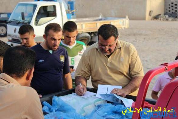 جمعية التضامن الاسلامي في الناصرية توزع المساعدات الانسانية على نازحي المناطق الساخنة - تقرير مصور - 