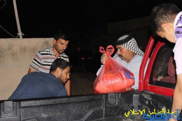 جمعية التضامن الاسلامي في الناصرية توزع المساعدات الانسانية على نازحي المناطق الساخنة - تقرير مصور - 
