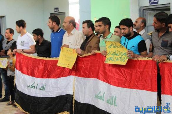 طلبة التضامن في الناصرية ينظمون وقفة تضامنيه مع الحشد الشعبي