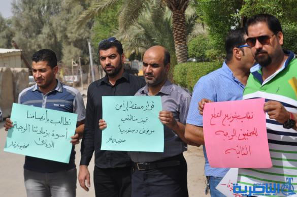  صحافيو ذي قار يتظاهرون لالغاء شرط مسقط الراس في توزيع الاراضي السكنية - تقرير مصور -