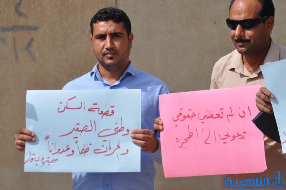  صحافيو ذي قار يتظاهرون لالغاء شرط مسقط الراس في توزيع الاراضي السكنية - تقرير مصور -