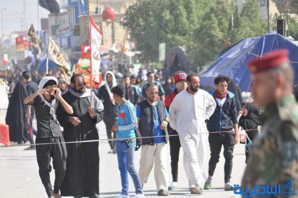 بالصور : طريق العشق الحسيني في ذي قار ينبض بالمشّائين الى كربلاء