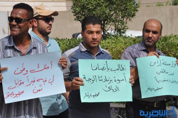  صحافيو ذي قار يتظاهرون لالغاء شرط مسقط الراس في توزيع الاراضي السكنية - تقرير مصور -