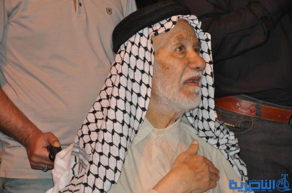 بالصور:المواكب الحسينية في ليلة التاسع من المحرم في الناصرية