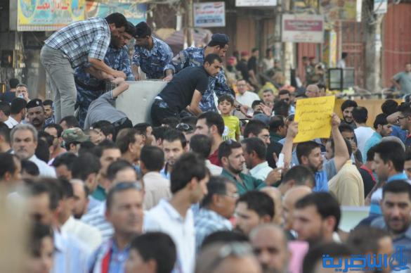 بالصور : الالاف يتظاهرون في الناصرية للمطالبة باصلاح النظام القضائي ومحاسبة المفسدين