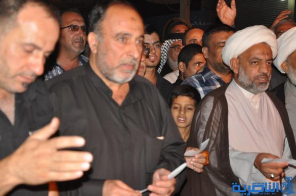 بالصور:المواكب الحسينية في ليلة التاسع من المحرم في الناصرية