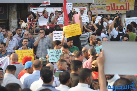 بالصور : الالاف يتظاهرون في الناصرية للمطالبة باصلاح النظام القضائي ومحاسبة المفسدين