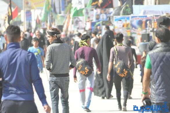 بالصور : طريق العشق الحسيني في ذي قار ينبض بالمشّائين الى كربلاء