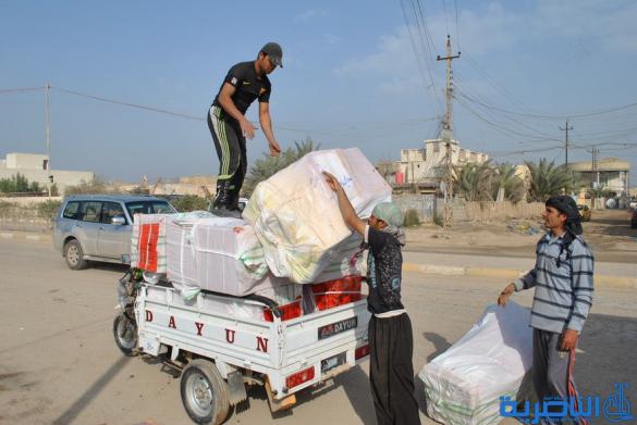 بالصور : في مدينة الشطرة الناس منشغلون فقط بصناعة الحياة 