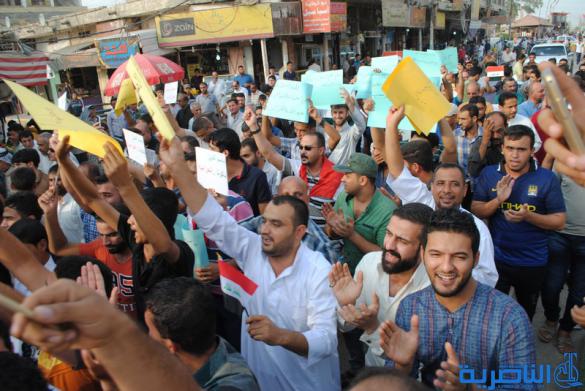 بالصور : المئات يتظاهرون في الشطرة بسبب تردي الواقع الخدمي