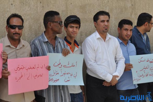  صحافيو ذي قار يتظاهرون لالغاء شرط مسقط الراس في توزيع الاراضي السكنية - تقرير مصور -