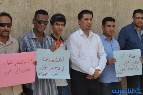 صحافيو ذي قار يتظاهرون لالغاء شرط مسقط الراس في توزيع الاراضي السكنية - تقرير مصور -