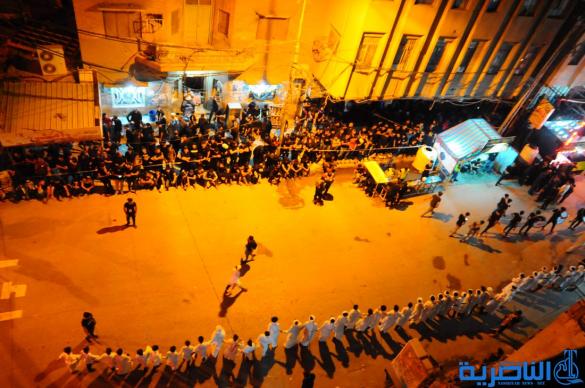 بالصور:مسير المواكب الحسينية وسط الناصرية في ليلة السابع من المحرم 