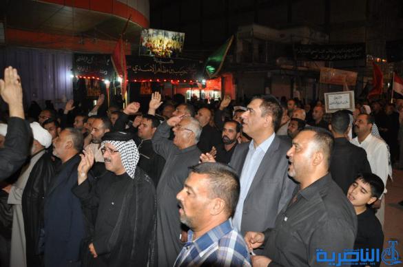بالصور:المواكب الحسينية في ليلة التاسع من المحرم في الناصرية