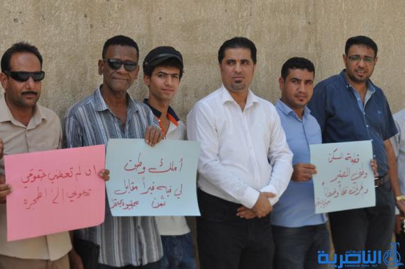  صحافيو ذي قار يتظاهرون لالغاء شرط مسقط الراس في توزيع الاراضي السكنية - تقرير مصور -