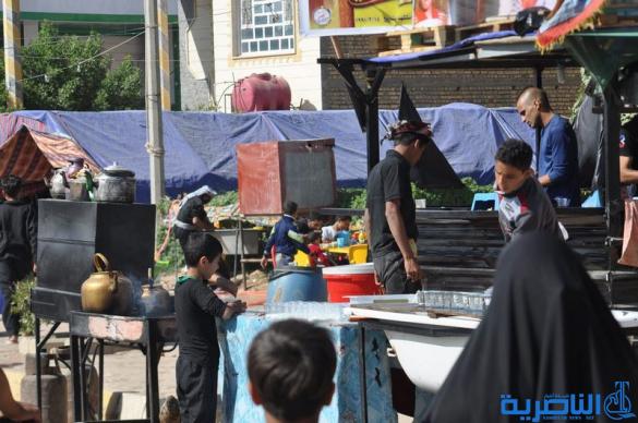 بالصور : طريق العشق الحسيني في ذي قار ينبض بالمشّائين الى كربلاء
