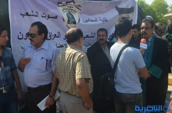 نقابة المحاميين في ذي قار تنظم تظاهرة للمطالبة بإلغاء رواتب أعضاء البرلمان – تقرير مصور -