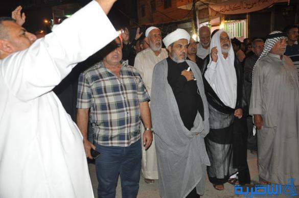بالصور:المواكب الحسينية في ليلة التاسع من المحرم في الناصرية