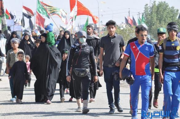 بالصور : طريق العشق الحسيني في ذي قار ينبض بالمشّائين الى كربلاء