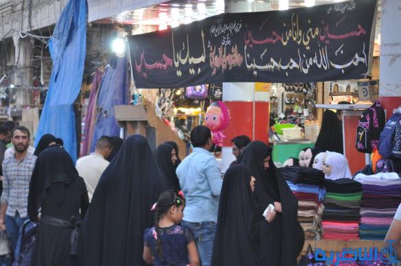 بالصور : الناصرية تتشح بالسواد في عزاء سيد الشهداء