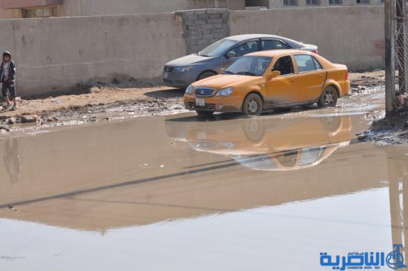 الناصرية : العشرات يتظاهرون في حي الشعلة احتجاجا على عمل الشركة المنفذة للمجاري – تقرير مصور -