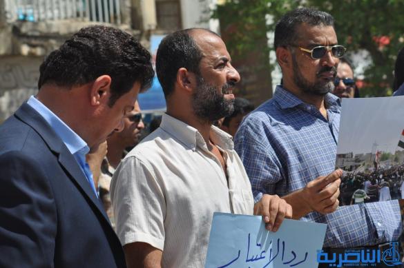 تظاهرة في الناصرية للمطالبة بإلغاء رواتب البرلمانيين وإيقاف اتفاقية خور عبد الله – تقرير مصور -