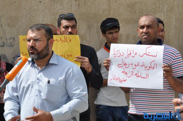  صحافيو ذي قار يتظاهرون لالغاء شرط مسقط الراس في توزيع الاراضي السكنية - تقرير مصور -