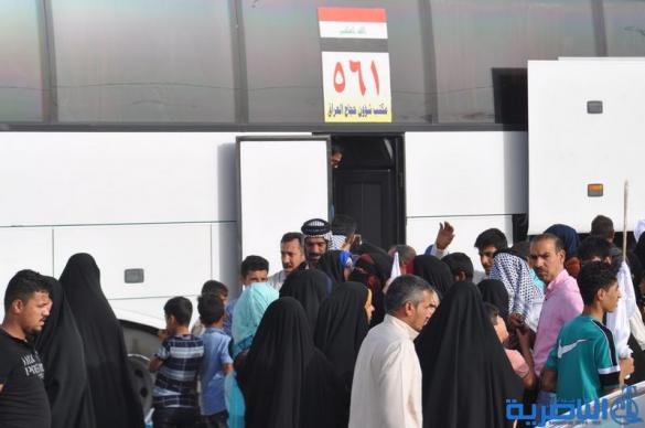 عودة 21 قافلة من حجاج ذي قار بعد اتمام مناسك الحج  - تقرير مصور -