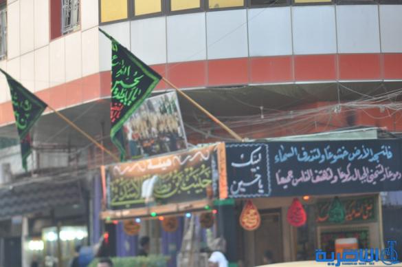 بالصور : الناصرية تتشح بالسواد في عزاء سيد الشهداء