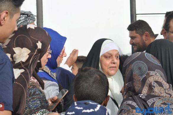 عودة 21 قافلة من حجاج ذي قار بعد اتمام مناسك الحج  - تقرير مصور -