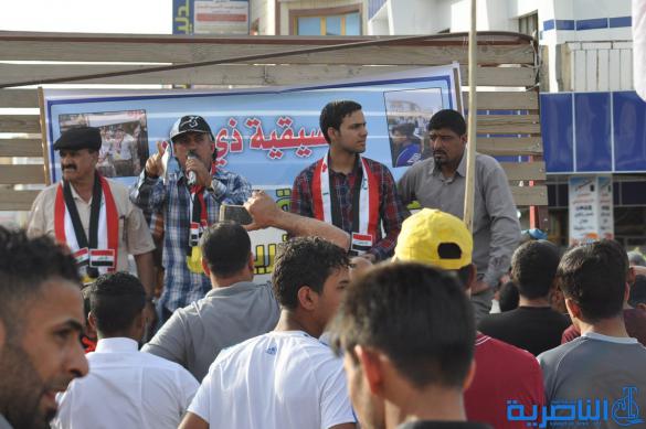 بالصور : العشرات يتظاهرون في الناصرية للمطالبات باصلاحات في العملية السياسية 