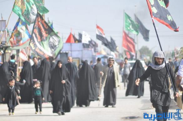 بالصور : طريق العشق الحسيني في ذي قار ينبض بالمشّائين الى كربلاء