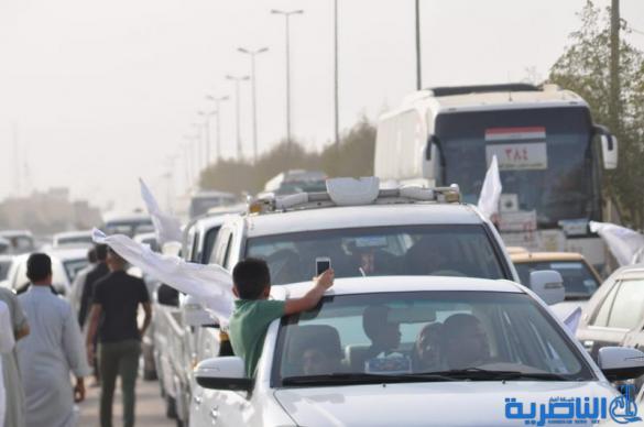 عودة 21 قافلة من حجاج ذي قار بعد اتمام مناسك الحج  - تقرير مصور -