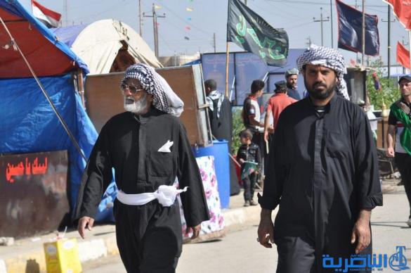 بالصور : طريق العشق الحسيني في ذي قار ينبض بالمشّائين الى كربلاء