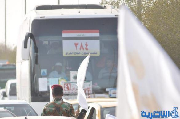 عودة 21 قافلة من حجاج ذي قار بعد اتمام مناسك الحج  - تقرير مصور -