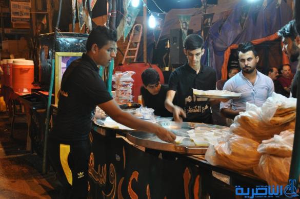 بالصور:احياء ذكرى ليلة التاسع من المحرم في مدينة الناصرية
