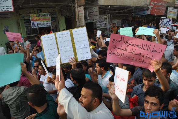 بالصور : المئات يتظاهرون في الشطرة بسبب تردي الواقع الخدمي