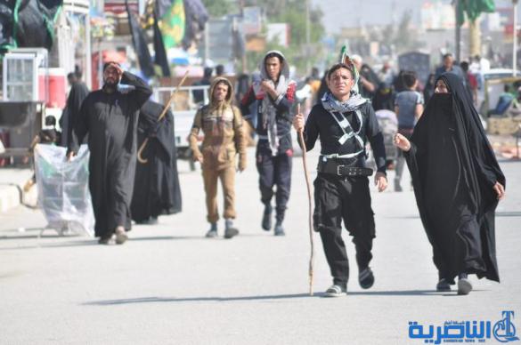 بالصور : طريق العشق الحسيني في ذي قار ينبض بالمشّائين الى كربلاء