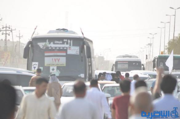 عودة 21 قافلة من حجاج ذي قار بعد اتمام مناسك الحج  - تقرير مصور -