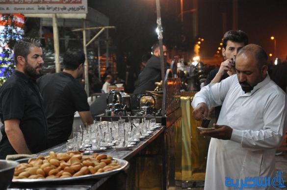 بالصور:احياء ذكرى ليلة التاسع من المحرم في مدينة الناصرية