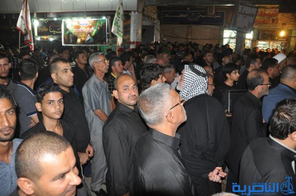 بالصور:المواكب الحسينية في ليلة التاسع من المحرم في الناصرية