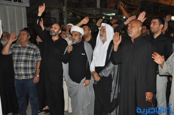 بالصور:المواكب الحسينية في ليلة التاسع من المحرم في الناصرية