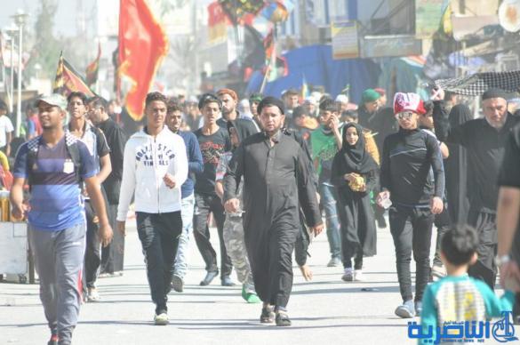 بالصور : طريق العشق الحسيني في ذي قار ينبض بالمشّائين الى كربلاء