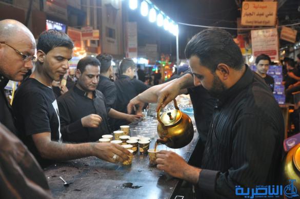 بالصور:احياء ذكرى ليلة التاسع من المحرم في مدينة الناصرية