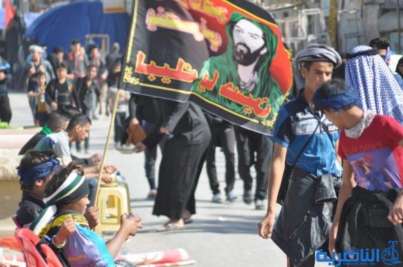 بالصور : طريق العشق الحسيني في ذي قار ينبض بالمشّائين الى كربلاء