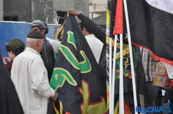 بالصور : الناصرية تتشح بالسواد في عزاء سيد الشهداء