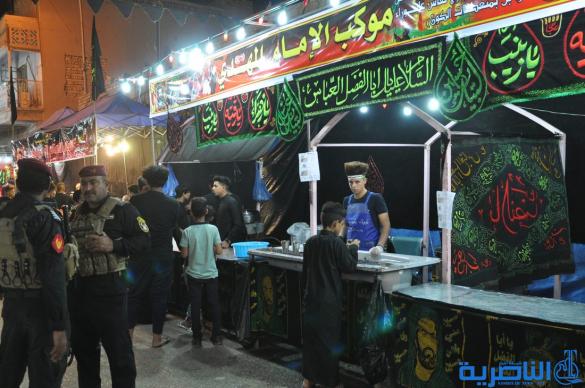 بالصور:احياء ذكرى ليلة التاسع من المحرم في مدينة الناصرية