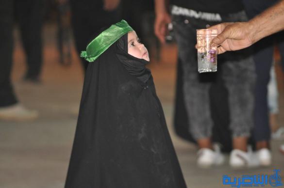 بالصور:احياء ذكرى ليلة التاسع من المحرم في مدينة الناصرية