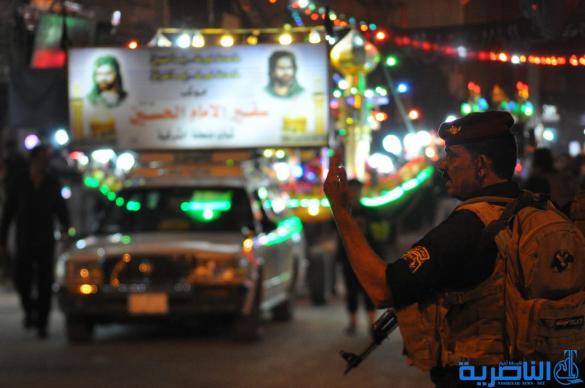 بالصور:احياء ذكرى ليلة التاسع من المحرم في مدينة الناصرية