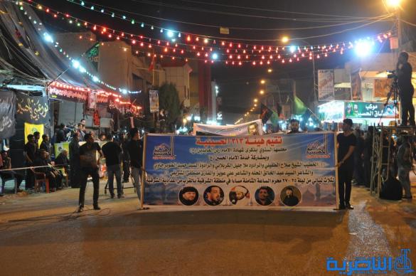 بالصور:احياء ذكرى ليلة التاسع من المحرم في مدينة الناصرية